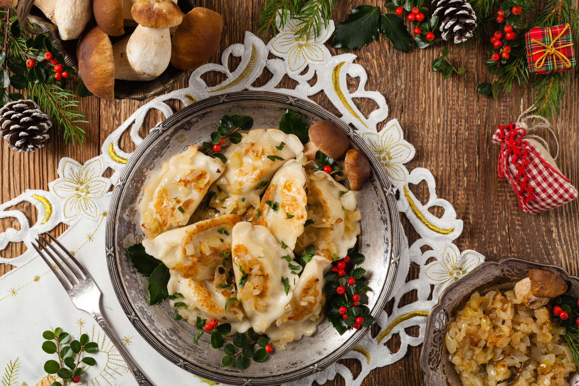 Traditional dumplings with cabbage and mushrooms. Christmas deco